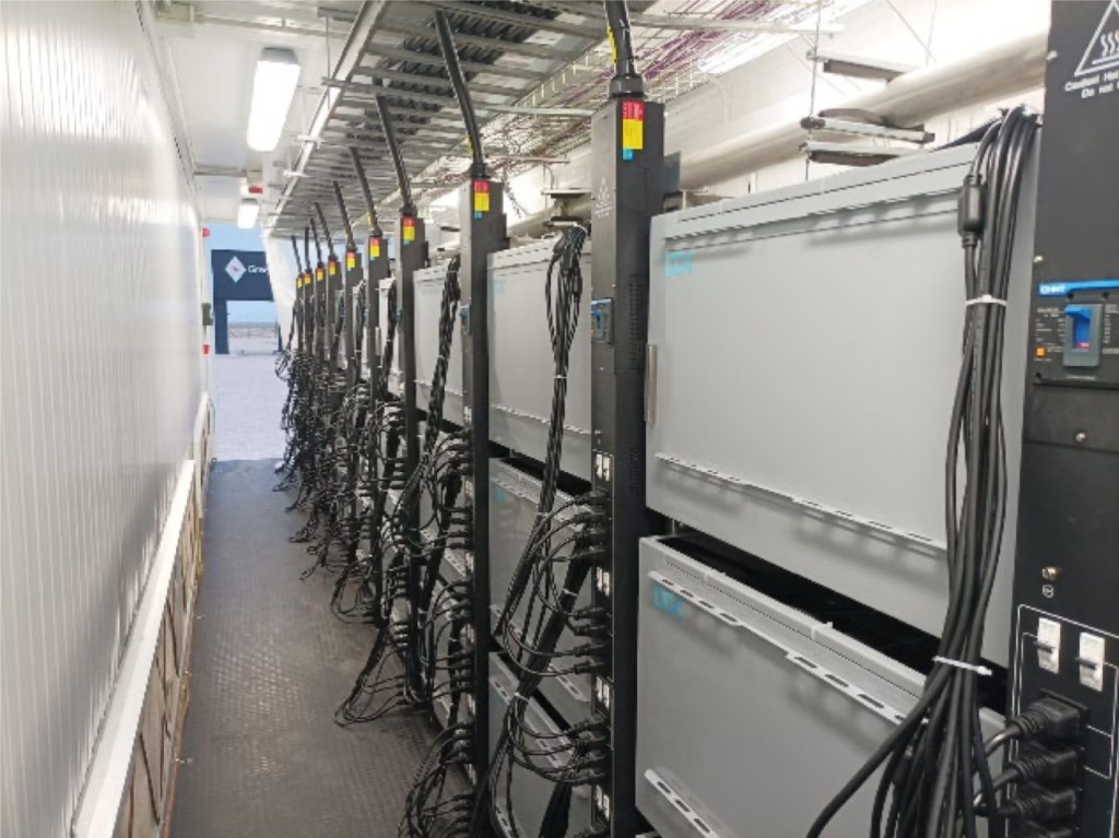 Bitmain Antminer S19j Pro+ units installed inside the containerised mining environment
